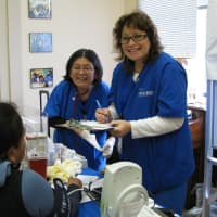<p>Yrma Benites, NWH Laboratory Technician and Patricia Hebert, RN at Northern Westchester Hospital check a person&#x27;s blood pressure.</p>