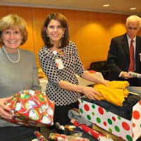 <p>Workers at Hudson Valley Hospital Center in Cortlandt Valley wrap gifts at Wednesday&#x27;s event.</p>