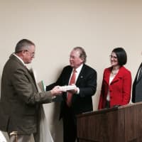 <p>Fairfield First Selectman Mike Tetreau and Selectmen Cristin McCarthy-Vahey and Kevin Kiley presented Tom Steinke with a gift and a certificate from U.S. Congressman Jim Himes recognizing him as the Employee of the Year. </p>