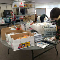 <p>Boxes fill the room the Our Saviour&#x27;s Lutheran Church in Fairfield has lent to Projects From The Heart for packaging.</p>