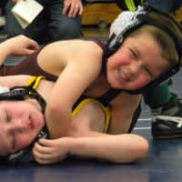 <p>Colin Falla  of the Norwalk Mad Bulls pins an opponent at the Bristol Gladiator Holiday Wrestling Tournament.</p>