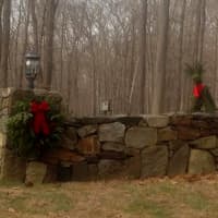 <p>A wreath and reindeer welcome visitors to this Redding home. </p>