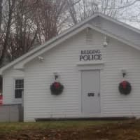 <p>The Redding Police Department keeps the decorations simple, with a classic set of wreaths flanking the doors. </p>