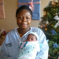 <p>Mother Respy Okang and her New Year&#x27;s baby boy Andrew at St. John&#x27;s Riverside Hospital.</p>