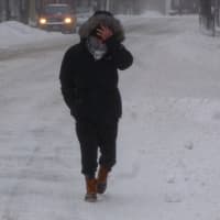 <p>Pedestrians navigated by using local roads before sidewalks were cleared. Traffic was light as many stayed off the roads.</p>