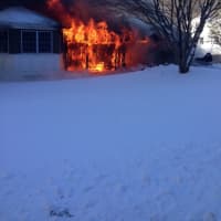 <p>A fire rages at 21 Faraway Rd. in Armonk.</p>