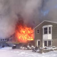 <p>The fast moving fire engulfed the home by the time firefighters arrived.</p>