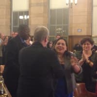 <p>Legislator Ken Jenkins (left) applauds new Chairman Michael Kaplowitz (center). </p>