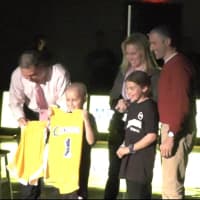 <p>Eli, who is battling cancer, is honored by the team.</p>