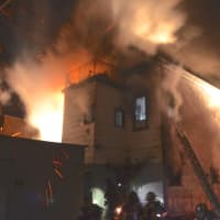<p>The fire rages in a multifamily home at 164 Beech St. </p>