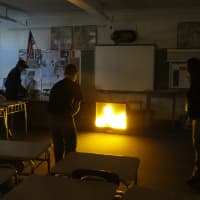 <p>Eastchester students attempted to extinguish faux flames in the classroom.</p>