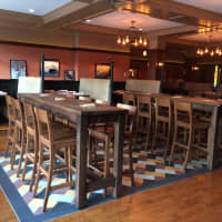 <p>The high-top tables at the Cask Republic include plugs for patrons to charge up. </p>
