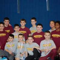 <p>Norwalk Mad Bull wrestlers took a team photo after the meet in Southington.</p>