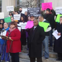 <p>Guisela Marroquin of the Lower Hudson Valley Civil Liberties Union speaks at a rally outside the Westchester County offices in White Plains on police reform.</p>