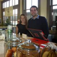 <p>Briana Pennell and Chris Barrett, co-owners of Steam Coffee Bar, celebrate the opening of their second location in Westport.</p>