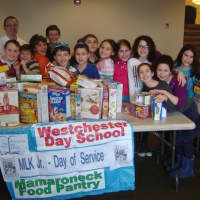 <p>Fifth grade students from Westchester Day School in Mamaroneck with all the food they collected as part of their Martin Luther King Jr. Day of Service</p>