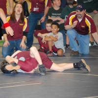 <p>Calli Gilchrist gets encouragement from supporters as she goes for a pin.</p>
