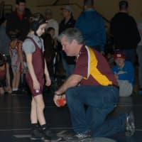 <p>Calli Gilchrist talks with coach Art Schad getting ready for a match</p>