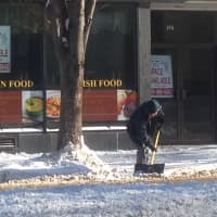 <p>Danbury residents and business owners had to clear the sidewalks of snow. </p>