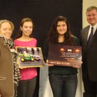 <p>Rye High School students Ellen Scully and Katrina Roth, with City Council Member Julie Killian and Mayor Joe Sack, two members of the panel of judges who picked the winning posters.</p>
