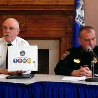 <p>Norwalk Fire Chief Denis McCarthy and Police Chief Thomas Kulhawik discuss new school safety plans at City Hall Thursday.</p>
