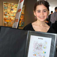 <p>Nina Driscoll, age 8, winner in the 6-8-year-old category of the 2013 Toy Makers II Design Competition, with her design for Your Decorate &amp; Design Dream House.
</p>