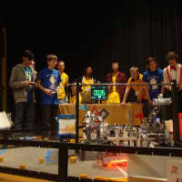 <p>Alliances of two teams compete against other alliances in a series of robot challenges in a tournament at Kennedy Catholic High School in Somers.</p>