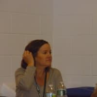 <p>Karen Corrado of the Yorktown Board of Education attends a meeting about full day kindergarten at Strang Middle School.</p>
