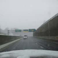 <p>The view from a care traveling west on 1-287 near White Plains at noon Monday showed that roads were clear and passable.</p>