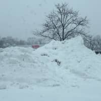 <p>Snow piles up in the Yorktown shopping center. </p>
