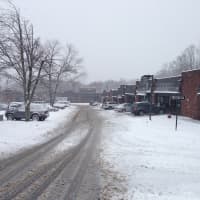 <p>The Orchard Park shopping center got a thick layer of snow Monday. </p>