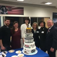 <p>Bakers from the Pink Cupcake Shack gather around their winning cake with Fairfield Chamber Director Beverly Balaz, Town Clerk Betsy Browne and First Selectman Mike Tetreau. </p>