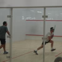 <p>Life Time members play in the squash courts at the Harrison facility.</p>