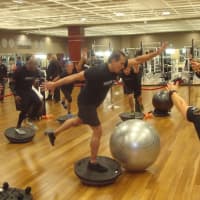 <p>Bahram Akradi, Life Time Fitness chair and chief executive officer,   leads a demonstration of his &quot;Ultimate Workout&quot; for members.</p>