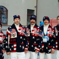 <p>Lugers Jayson Terdiman and Tucker West, far right, pose with skiers Bode Miller, TJ Lanning and Jared Goldberg before the opening ceremonies begin. </p>