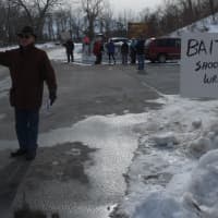 <p>Resdents hand out flyers protesting Teatown&#x27;s deer culling to cars entering Croton Point Park Saturday. </p>