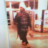 <p>The second suspect is described as a black male wearing a white knit hat, long black jacket and a plaid shirt.</p>