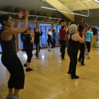 <p>Patrons dance and have fun in fitness classes offered during open house. </p>