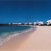<p>Resort villas designed by Myron Goldfinger stretch along 1,000 feet of white-sand beaches in the Caribbean. </p>