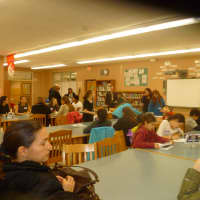 <p>Students attend a forum about the Common Core held at Cooper Beech Middle School on Tuesday.</p>