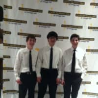 <p>Students Matthew Bombassei, Gregory Goldberg and Edwin Zhou performed at Carnegie Hall with the 2014 High School Honors Performance Band. </p>