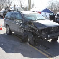 <p>A New York woman was charged Tuesday with crashing into the back of a Wilton police vehicle.</p>