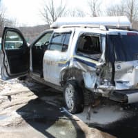 <p>Wilton Police Detective Kip Tarrant was hospitalized Tuesday after his SUV was rear-ended.</p>