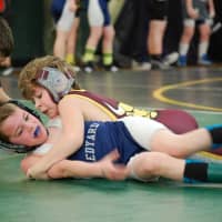 <p>Norwalk&#x27;s Jack Cahill clamps down on an opponent.</p>