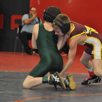 <p>Mikey Bartush of the Norwalk Mad Bulls (right) wrestles an opponent.</p>