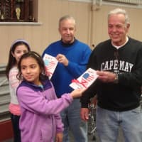 <p>Students from Parsons Elementary School hand Valentine&#x27;s Day Cards to Harrison veterans as part of the &quot;Valentines for Vets&quot; program.</p>