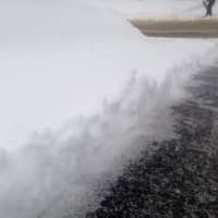 <p>A carefully shoveled path turns to ice during the nor&#x27;easter on Thursday. </p>