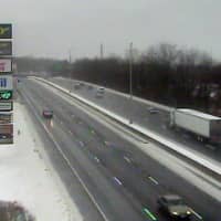 <p>Few cars are on northbound Interstate 95 during the usual afternoon rush-hour time near the Darien rest stop. </p>