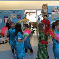 <p>Part of the celebration included a parade through the halls of the school. </p>