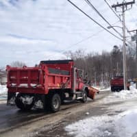 <p>Trucks are out clearing the roads, but dumping no salt, in Ridgefield. </p>